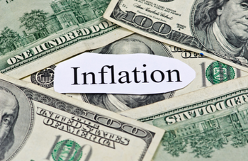 Inflation surrounded by dollar bills